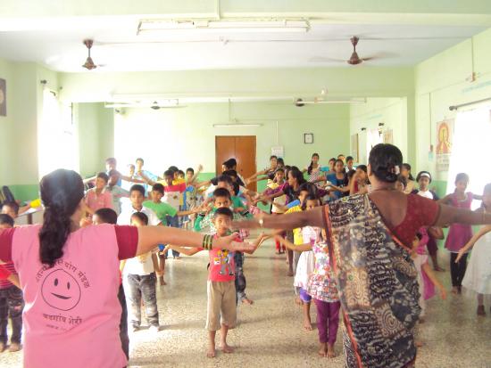 Summer camp children enjoying the yoga sessions at HOPE center.